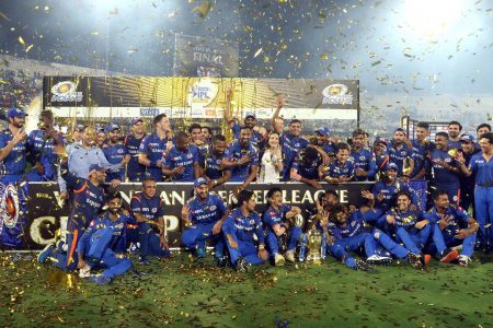 The Mumbai Indians celebrate their fourth title triumph after eking out a one-run win over the Chennai Super Kings in the IPL final yesterday. (Photo courtesy IPL website)