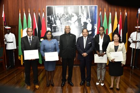 From left are new Minister of Business Haimraj Rajkumar, new Minister of Foreign Affairs , Dr Karen Cummings, President David Granger, Prime Minister Moses Nagamootoo, new Minister of the Public Service in the Ministry of the Presidency, Tabith Sarabo-Halley and new Minister of State Dawn Hastings-Williams. (Ministry of the Presidency photo)