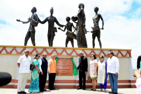 President David Granger (fourth from right) and Akhilesh Mishra, Director General of the Indian Council for Cultural Relations (fourth from left) after the unveiling yesterday of the Indian Arrival Monument, located at Palmyra, East Berbice-Corentyne.  Also in photo from right are Prime Minister Moses Nagamootoo, his wife Sita, First Lady Sandra Granger, Indian High Commissioner to Guyana, Venkatachalam Mahalingam, his wife Anu and businessman Hemraj Kissoon. (Ministry of the Presidency photo)
