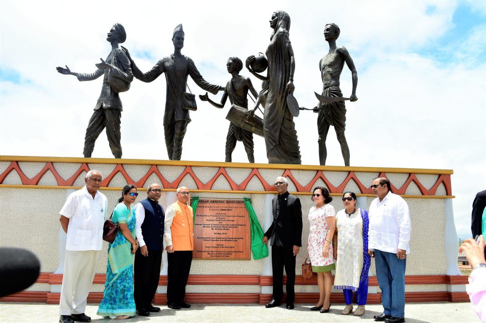 President David Granger (fourth from right) and Akhilesh Mishra, Director General of the Indian Council for Cultural Relations (fourth from left) after the unveiling yesterday of the Indian Arrival Monument, located at Palmyra, East Berbice-Corentyne.  Also in photo from right are Prime Minister Moses Nagamootoo, his wife Sita, First Lady Sandra Granger, Indian High Commissioner to Guyana, Venkatachalam Mahalingam, his wife Anu and businessman Hemraj Kissoon. (Ministry of the Presidency photo)
