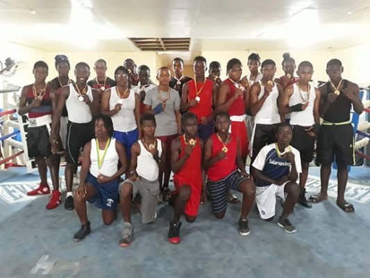  The boxers which competed on the Pepsi Mike Parris Under 16 event on Saturday at the Andrew ‘Six Head’ Lewis Gym pose for a photo.