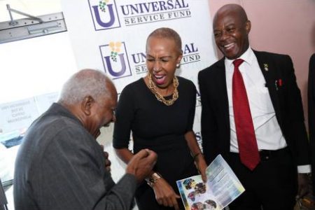 
Rudolph Brown
The Reverend Al Miller (left), pastor of Fellowship Tabernacle church, shares a joke with Fayval Williams, minister of science, energy and technology, and Daniel Dawes, chief executive officer of the Universal Service Fund, at the entity’s 14th anniversary church service yesterday at Fellowship Tabernacle, 2 Fairfield Avenue, Kingston.