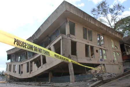  The old Besson Street Police Station which residents fear could collapse onto surrounding streets after a main support beam was accidentally destroyed during demolition work yesterday.