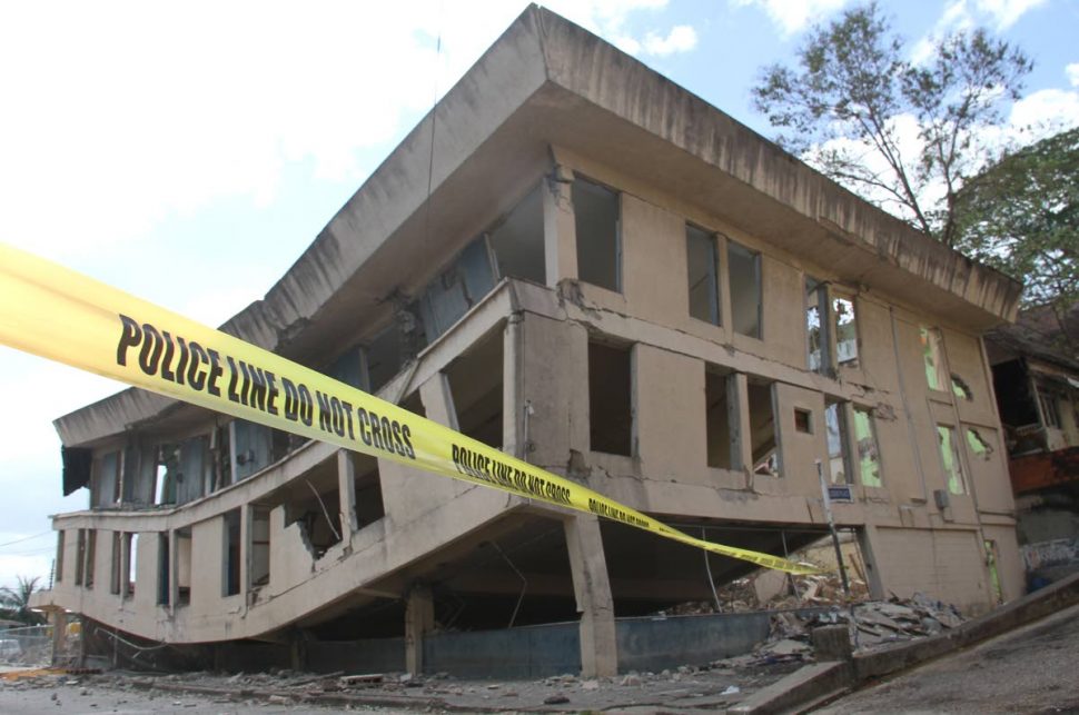  The old Besson Street Police Station which residents fear could collapse onto surrounding streets after a main support beam was accidentally destroyed during demolition work yesterday.