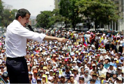 Juan Guaido speaking to protesters (Reuters photo)