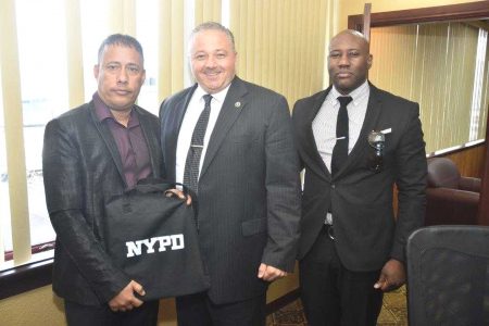 Police Commissioner Gary Griffith with NYPD’s Deputy Inspector of Police, Ray Festino and Sergeant Damon Martin.