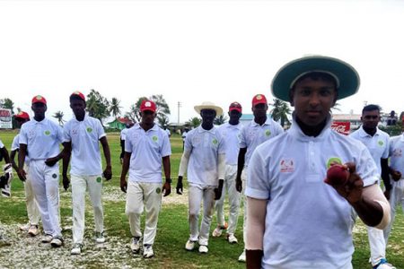 Leading the way! Left-arm orthodox spinner, Kelvin Umroa leads Berbice in after bowling out Select Under-17 within an hour of the day’s play, taking 5-55