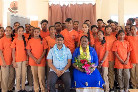Minister within the Ministry of the Presidency with responsibility for Youth Affairs,  Simona Broomes and Mayor of Georgetown, Ubraj Narine along with the grades 10 and 11 students of the Valmiki Vidyalaya High School. (Ministry of the Presidency photo)