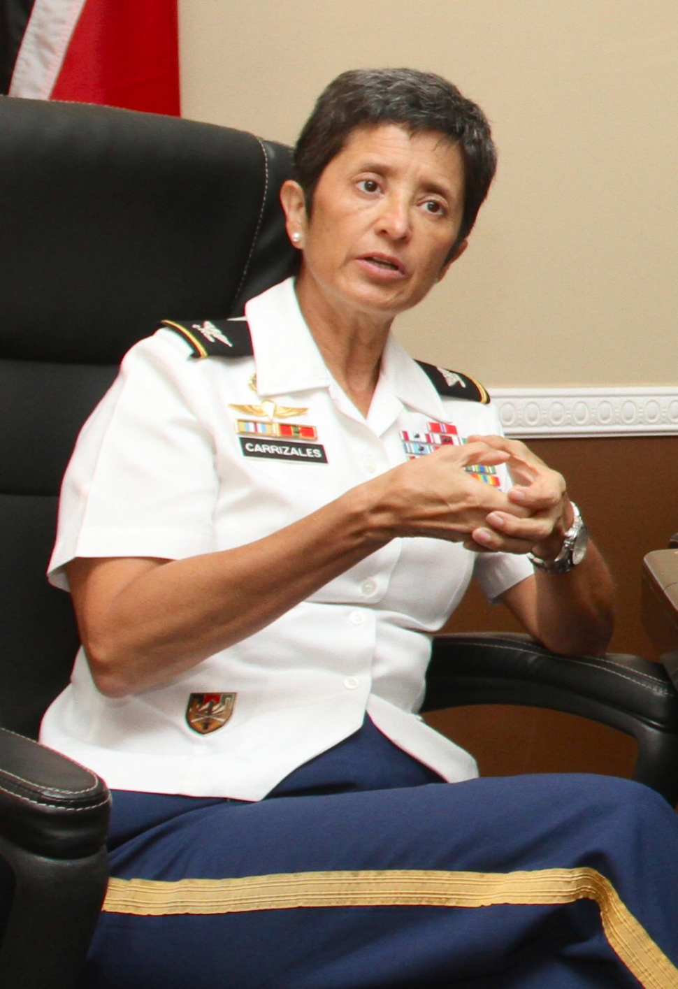 Colonel Clau­dia Car­riza­les
