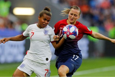 England’s Nikita Parris (left) in action with Norway’s Kristine Minde. (REUTERS/Phil Noble)