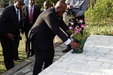 President of Ghana, Nana Akufo-Addo, lays a floral tribute at the shrine of three African slaves at Seville Great House and Heritage Park in St Ann on Saturday.