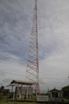 The former GuySuco transmission tower at Drill, now outfitted with two mircrowave relay dishes. (Photo by Terrence Thompson)