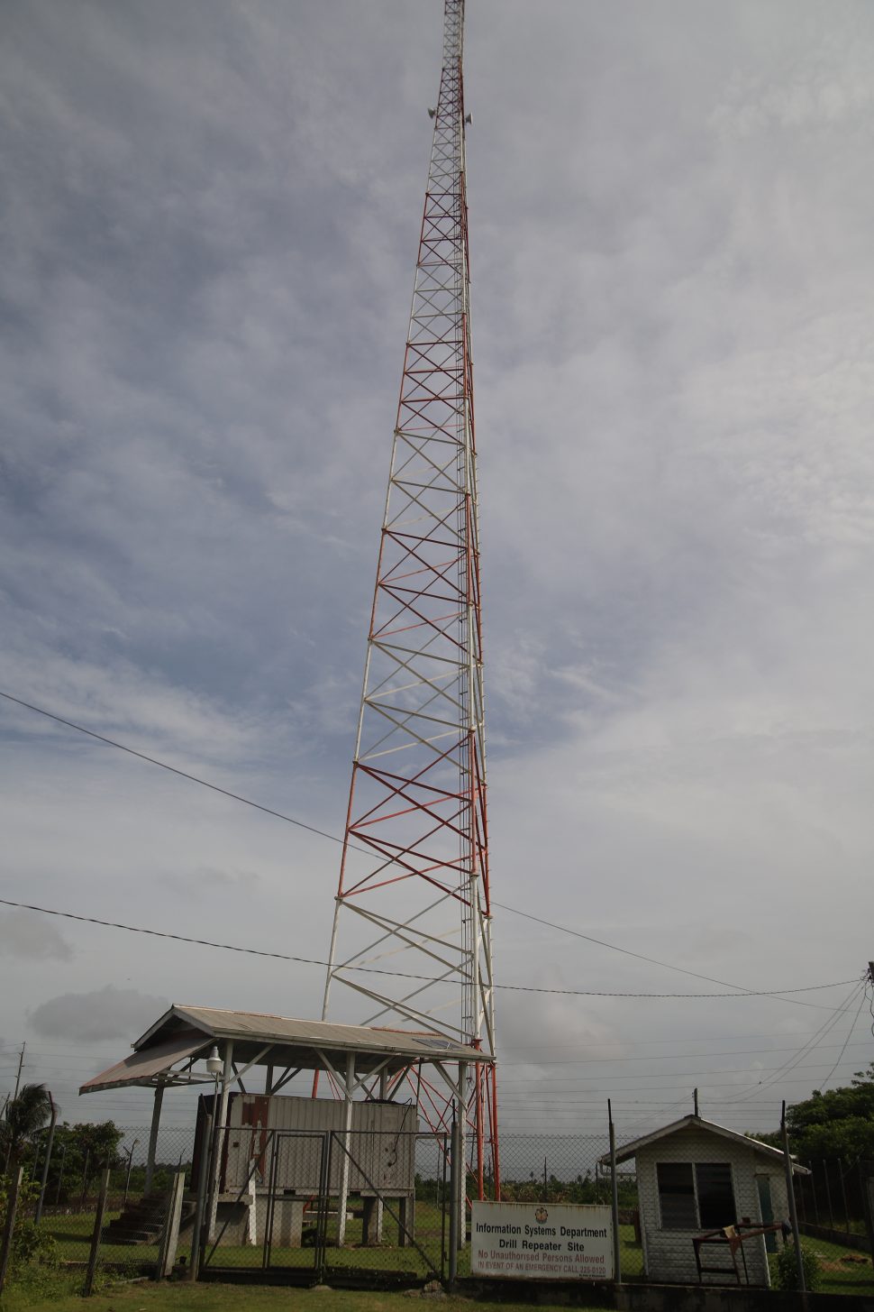 The former GuySuco transmission tower at Drill, now outfitted with two mircrowave relay dishes. (Photo by Terrence Thompson)