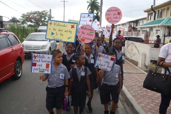 The only subject that counts? Students who were part of the Maths Walk organised yesterday by the Georgetown Department of Education as part of its continued efforts to promote the subject.   (Photo by Terrence Thompson) 