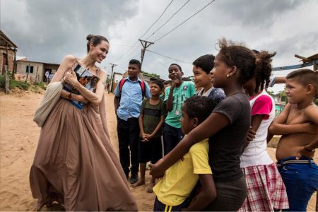 Special Envoy for the United Nations High Commissioner for Refugees, Angelina Jolie, speaks to people in Riohacha, Colombia on Friday. (UNHCR/Andrew McConnell/Handout via Reuters)
