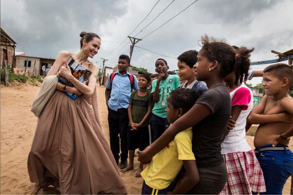 Special Envoy for the United Nations High Commissioner for Refugees, Angelina Jolie, speaks to people in Riohacha, Colombia on Friday. (UNHCR/Andrew McConnell/Handout via Reuters)
