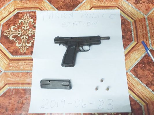 The unlicensed pistol and three live rounds of ammunition that were among the items found.