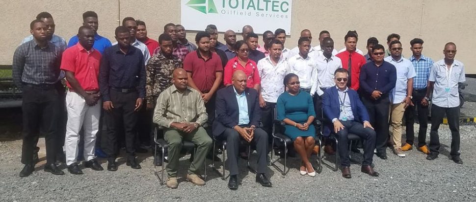 Seated from left are: Joseph Singh, General Manager of TOTALTEC; Minister of Natural Resources, Raphael Trotman; Marissa Foster, Geologist at the Department of Energy; and CEO of TOTALTEC, Lars Mangal, along with the batch of trainees at the TOTALTEC Oilfield Academy.