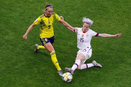 Sweden’s Kosovare Asllani (left) in action with Megan Rapinoe of the U.S. (REUTERS/Phil Noble)
