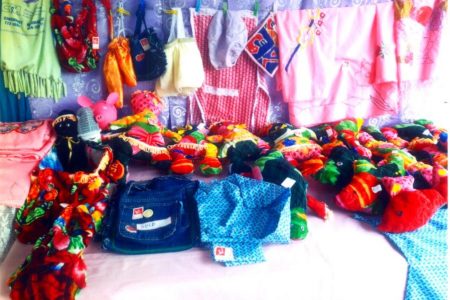 Handmade bags, stuffed toys and clothing made by the Vilvoorden Women’s Creative Group during one of the sewing sessions.
