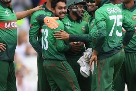 Some members of the Bangladesh cricket team celebrate their upset win over South Africa in the 2019 World Cup competition yesterday.
