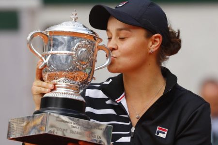 Ashleigh barty kisses the French Open trophy after winning yesterday’s women’s final against Czech Marketa Vondrousiva. (Reuters photo)
