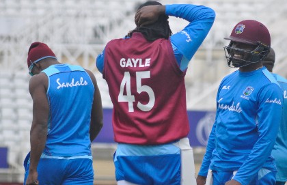 Batsman Darren Bravo (right) chats with Chris Gayle during a training session head of Thursday’s clash with Australia at Trent Bridge. (Photo courtesy CWI Media)