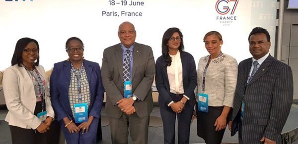 Minister of Natural Resources Raphael Trotman (third from left) with the delegation.