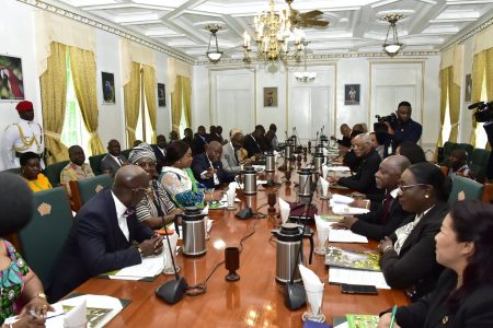 President David Granger (fifth, right) pays keen attention as President of Ghana,  Nana Addo Dankwa Akufo-Addo (fifth, left) introduces the members of his delegation during a meeting at State House. (Ministry of the Presidency photo)