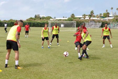Members of the Golden Jaguars unit going through their paces at the Bermuda National Training Centre ahead of their international friendly with the host nation.
