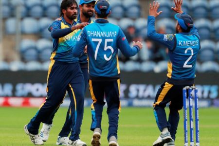 Sri Lanka’s Nuwan Pradeep and team mates celebrate the wicket of Afghanistan’s Hashmatullah Shahidi.Reuters/Andrew Couldridge
