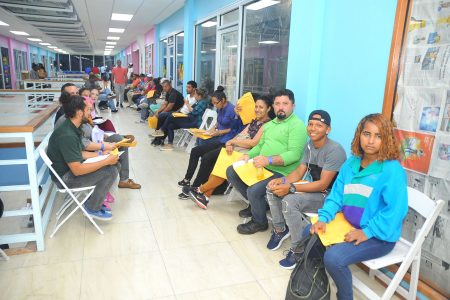 Venezuelans waiting to register at the Caroline Building in Scarborough, Tobago, on Saturday.