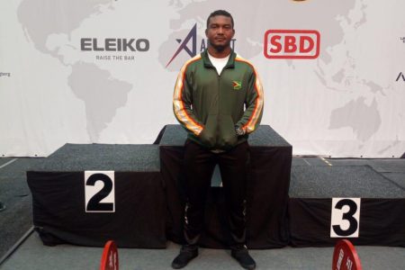 Carlos Petterson posing near the podium in Sweden. His aim is to climb the podium steps next year where the World Classic Powerlifting Championships will be staged in Belarus.
