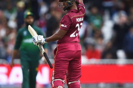 Nicholas Pooran celebrates West Indies’ win over Pakistan after hitting the winning run in the match at Trent Bridge yesterday. (Photo courtesy CWI Media)