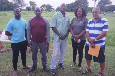(L-R) Physiotherapist Akeem Fraser, a member of the Guyana Rugby Football Union, Technical Director Sherlock Solomon, GRFU Secretary Petal Adams and Manager John Lewis at the National Park yesterday.