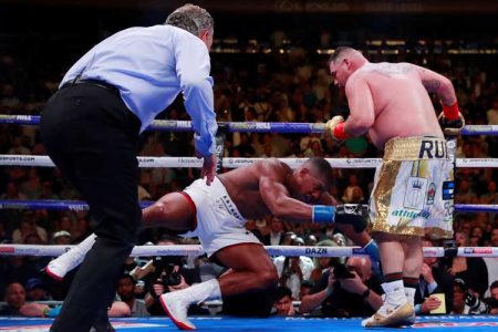 Anthony Joshua, left, was knocked out by Andy Ruiz Jr., a massive underdog. (Reuters photo)