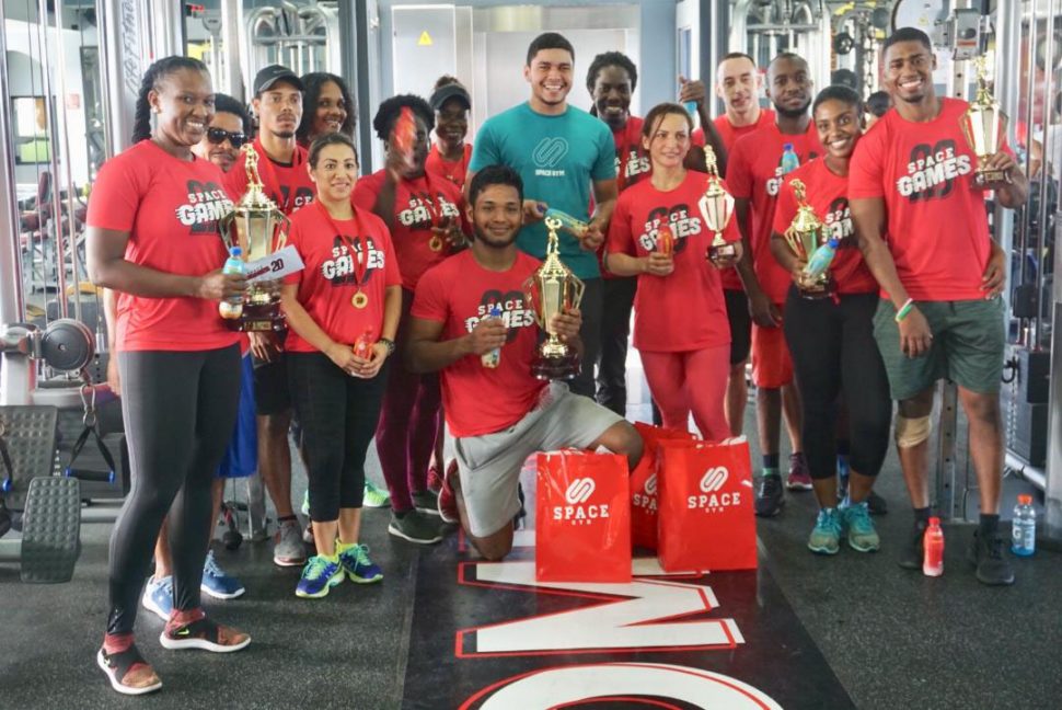 The competitors of Space Games 2.0 pose for a group photo with Gym Manager, Lucas Matos following the event yesterday at Space Gym. At extreme left in Anita Delph (the female winner) and Ramnarine Singh (male winner stooping).
