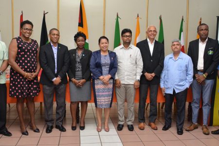 Director, Department of Energy, Dr. Mark Bynoe, third from left, is flanked by, from left to right: Ministry of Communities, Chief Planning Officer, Roger Rogers; Minister within the Ministry of Communities, Annette Ferguson; Chief Development Planner,  Germene Stewart; Minister of State,  Dawn Hastings-Williams; Mayor of Georgetown,  Ubraj Narine; Minister of Communities,  Ronald Bulkan; Minister within the Ministry of Finance,  Jaipaul Sharma; Deputy Mayor of Georgetown,  Alfred Mentore and Permanent Secretary in the Ministry of Communities, Emil McGarrell. (Ministry of the Presidency photo)
