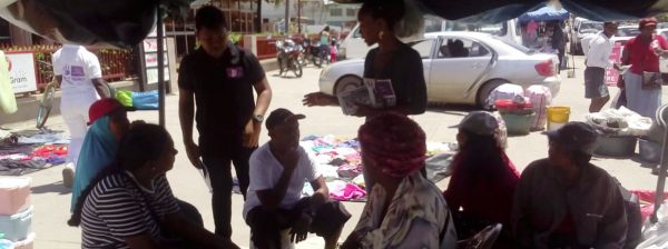 Businessman Randy Shephard and a team  gathered in front the Spready’s Supermarket in Berbice, where they interacted with residents.