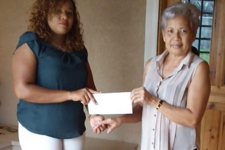  Windjammer representative; Shannon Stevenson (left) hands over the sponsorship cheque to Cheryl Gonsalves of the GMR&SC at the club’s Thomas Lands and Albert Street office.