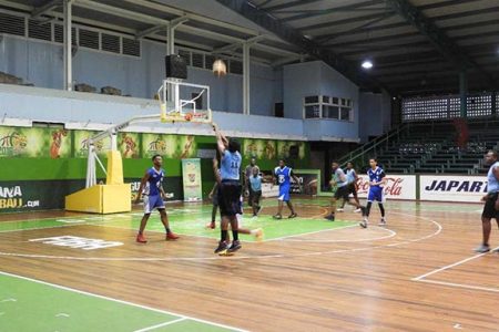 Action in the U18 clash between Marian Academy and Plaisance in the YBG ‘Regional Conference’ at the Cliff Anderson Sports Hall, Homestretch Avenue.