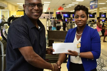 Court’s Brand Manager Odetta Aaron presented the sponsorship pact to GBA’s President Steve Ninvalle on Tuesday.
