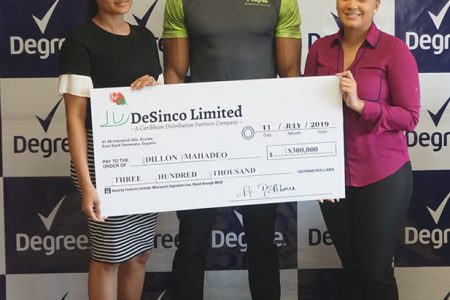 Senior Brand Manager of the Degree Brand, Sarah Savory (right) presented a cheque worth $300,000 to Dillon Mahadeo.