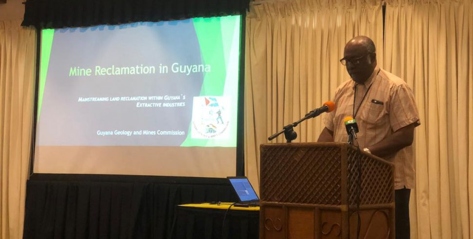 Commissioner of the Guyana Geology and Mines Commission Newell Dennison making his presentation at the event yesterday 
