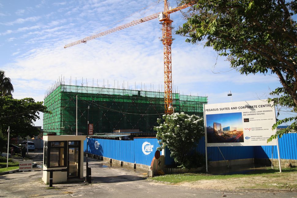 Moving up: The Pegasus Suites and Corporate Centre taking shape. The US$100M project in Kingston comprises a 12-storey tower providing long term accommodation and a seven-storey complex providing First World Corporate Offices. It is set to be completed in September next year. (Terrence Thompson photo)