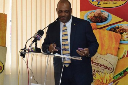 Richard Bowen chairing a function last year in St Andrew, Jamaica.