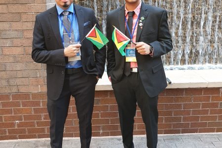 Steven Singh (at left) and Shazam Somwar outside the United Nations Headquarters in New York.