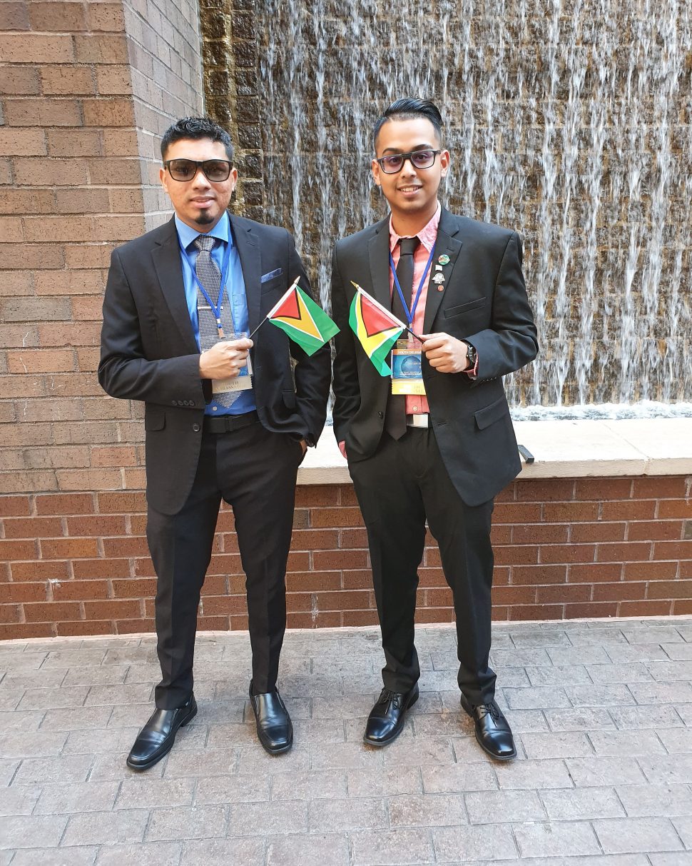 Steven Singh (at left) and Shazam Somwar outside the United Nations Headquarters in New York.