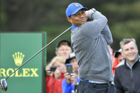 Tiger Woods hits his tee shot. (Steve Flynn-USA TODAY Sports)

