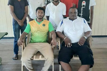 The newly elected Whim Cricket Club executive with President Karran Ramsammy seated at left.